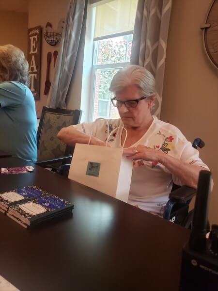 woman opening present